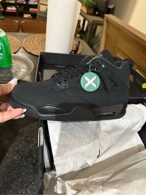 Jordan Black High-Top Sneakers with Green Tag